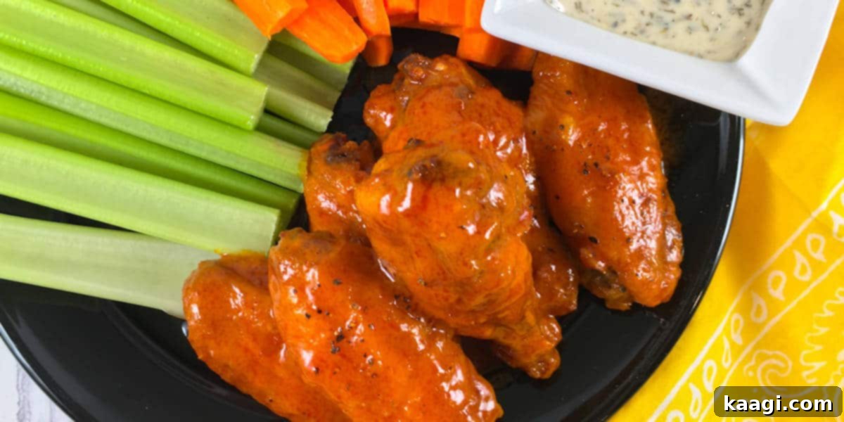 Air Fryer Frozen Chicken Wings, transformed into Keto Buffalo Wings, a delicious and easy crowd-pleaser.