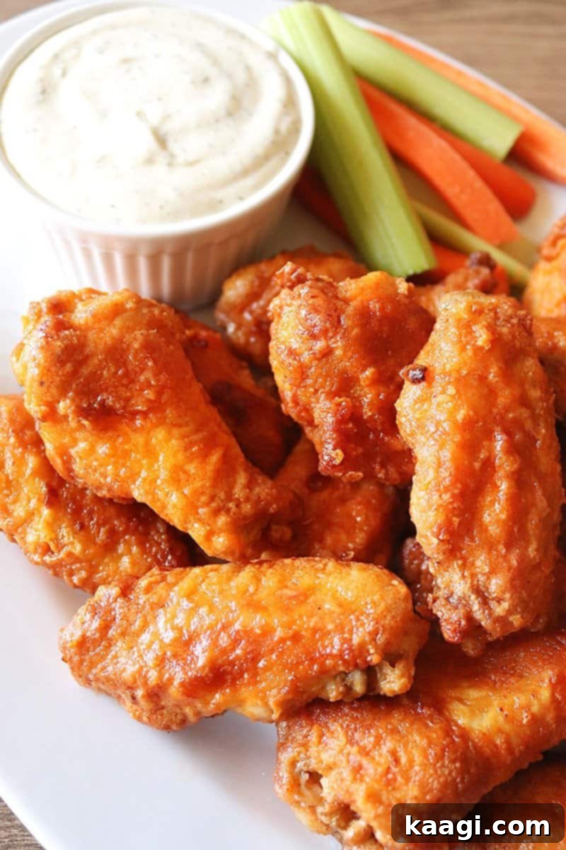 Air Fryer Hooter's Chicken Wings Copycat Recipe, perfectly crispy and mimicking the restaurant favorite.
