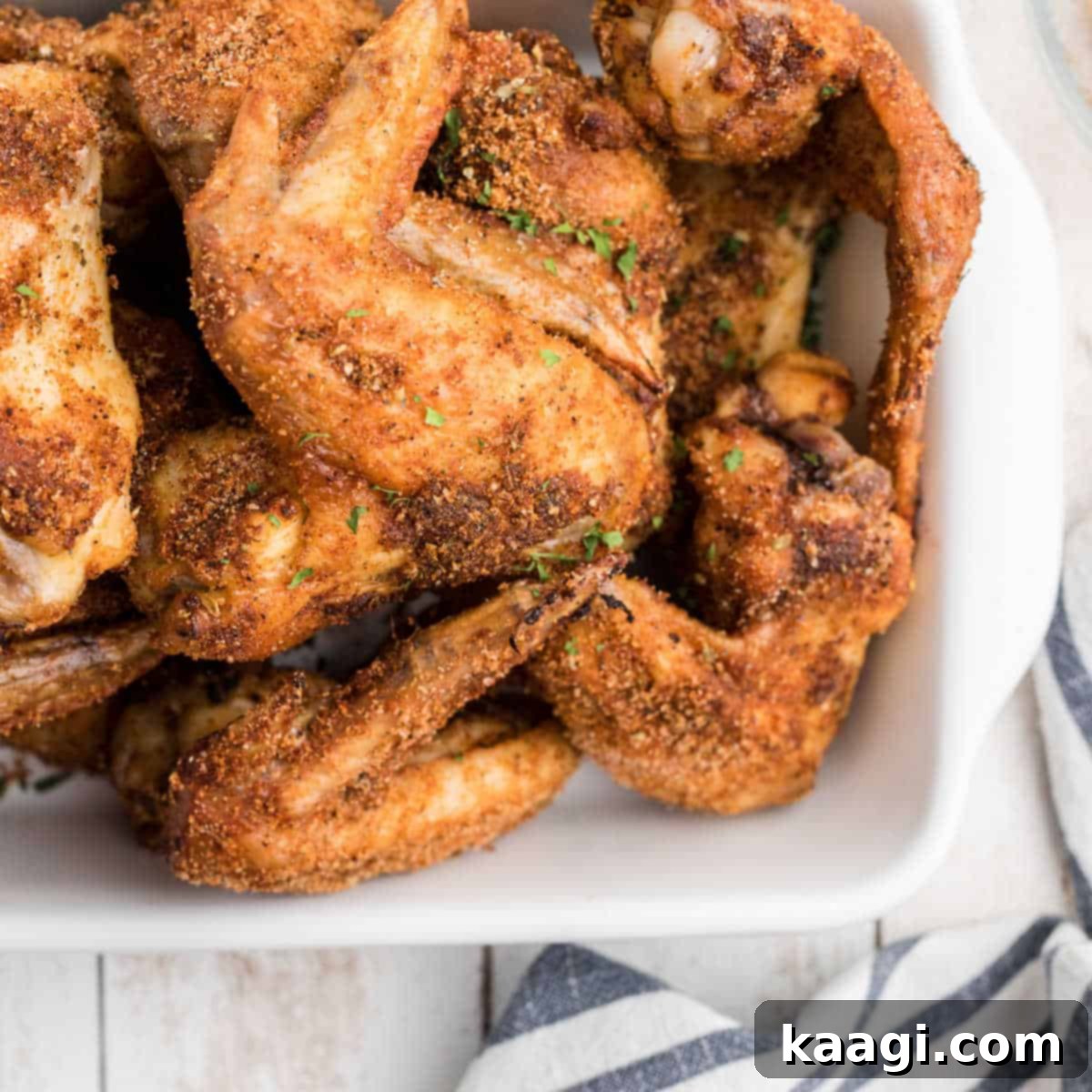 Wingstop Louisiana Rub Recipe on some wings cooked and in a dish, showing their golden brown, seasoned exterior.
