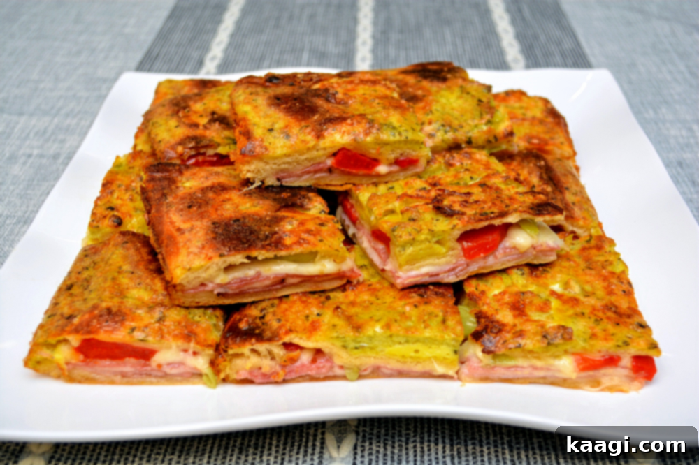 Italian Antipasto Squares, a hearty appetizer or main dish with classic antipasto ingredients encased in crescent dough.