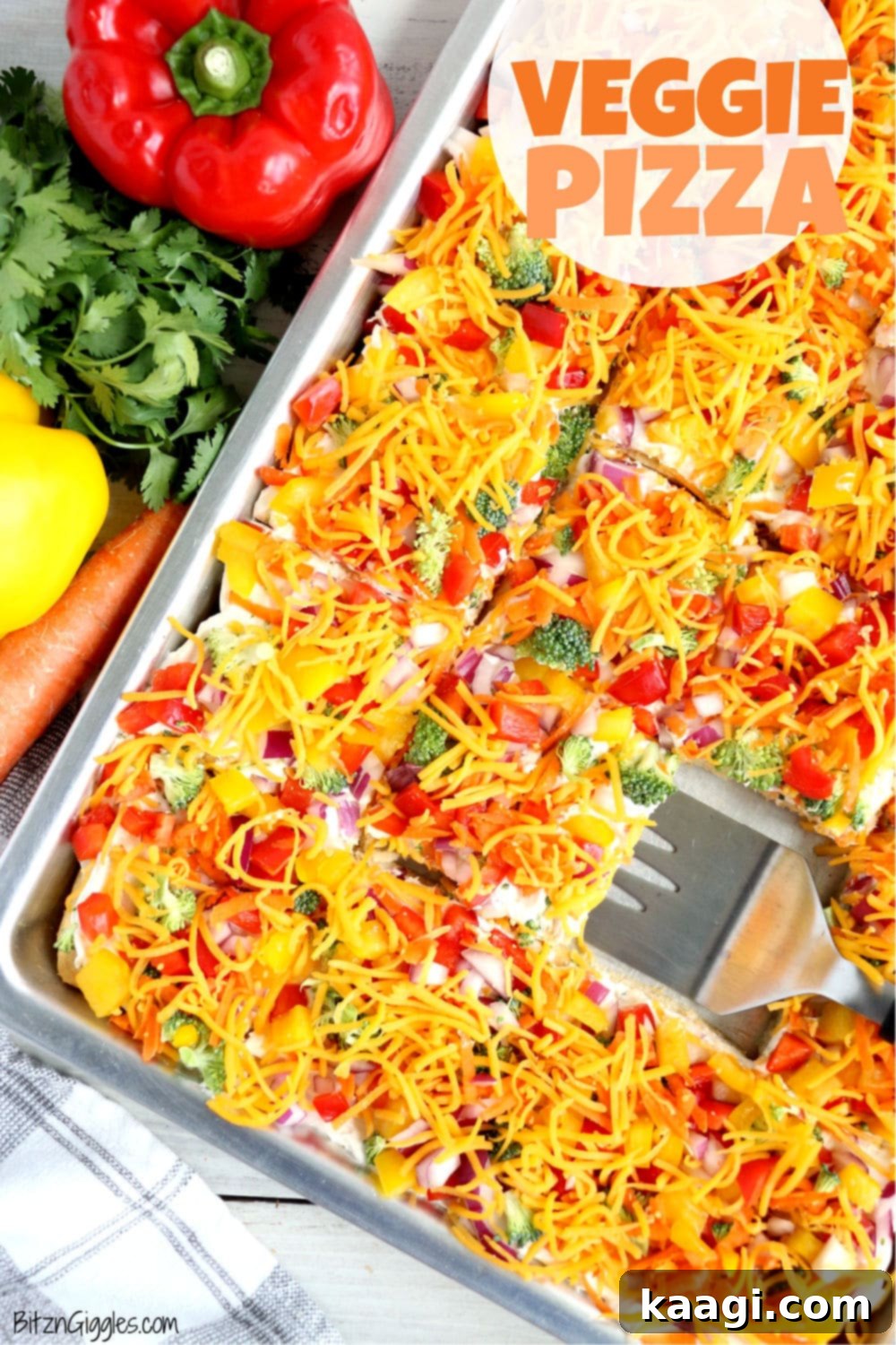 Colorful Veggie Pizza, featuring crunchy vegetables atop a ranch-flavored crescent roll crust, a tasty party appetizer.