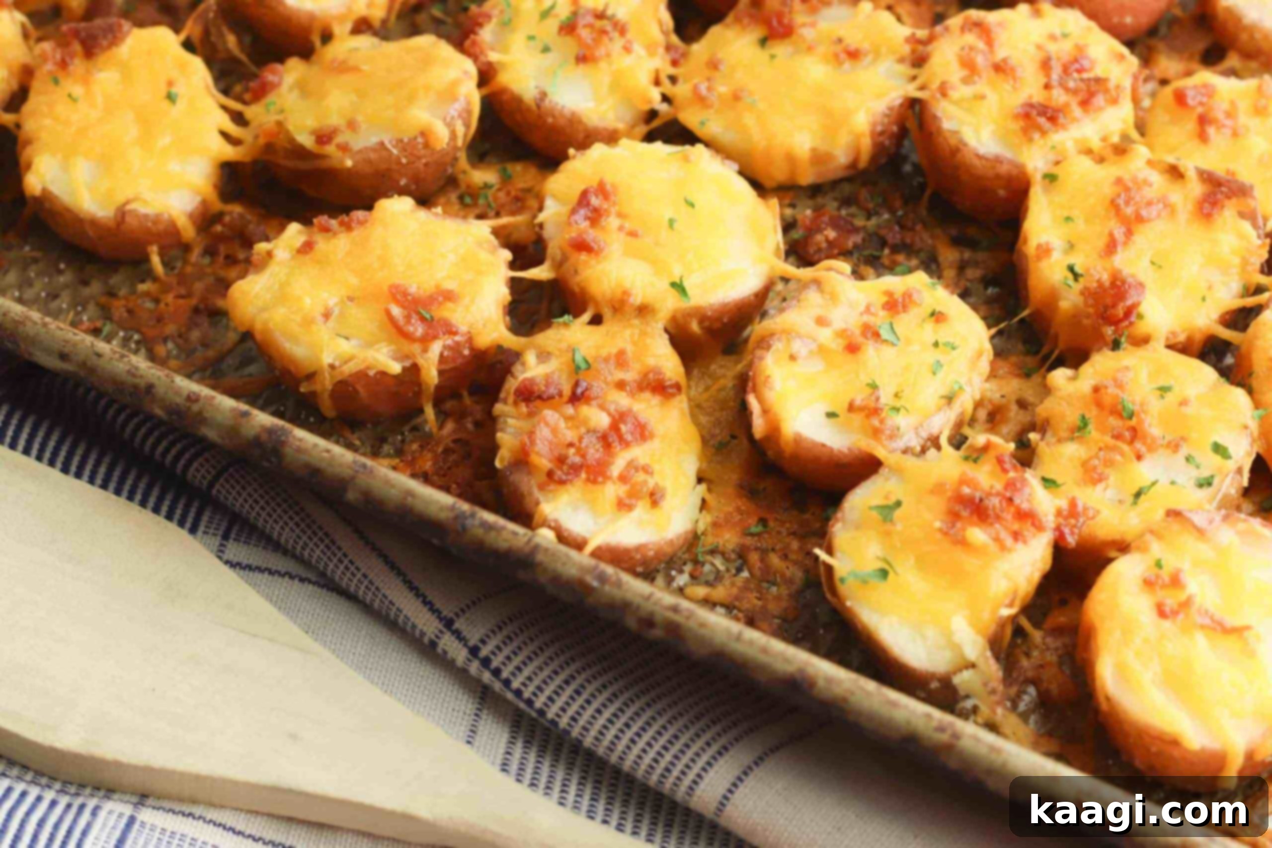 Easy Loaded Potato Bites, oven-baked and topped with cheddar cheese, bacon, and parsley, perfect for any party.