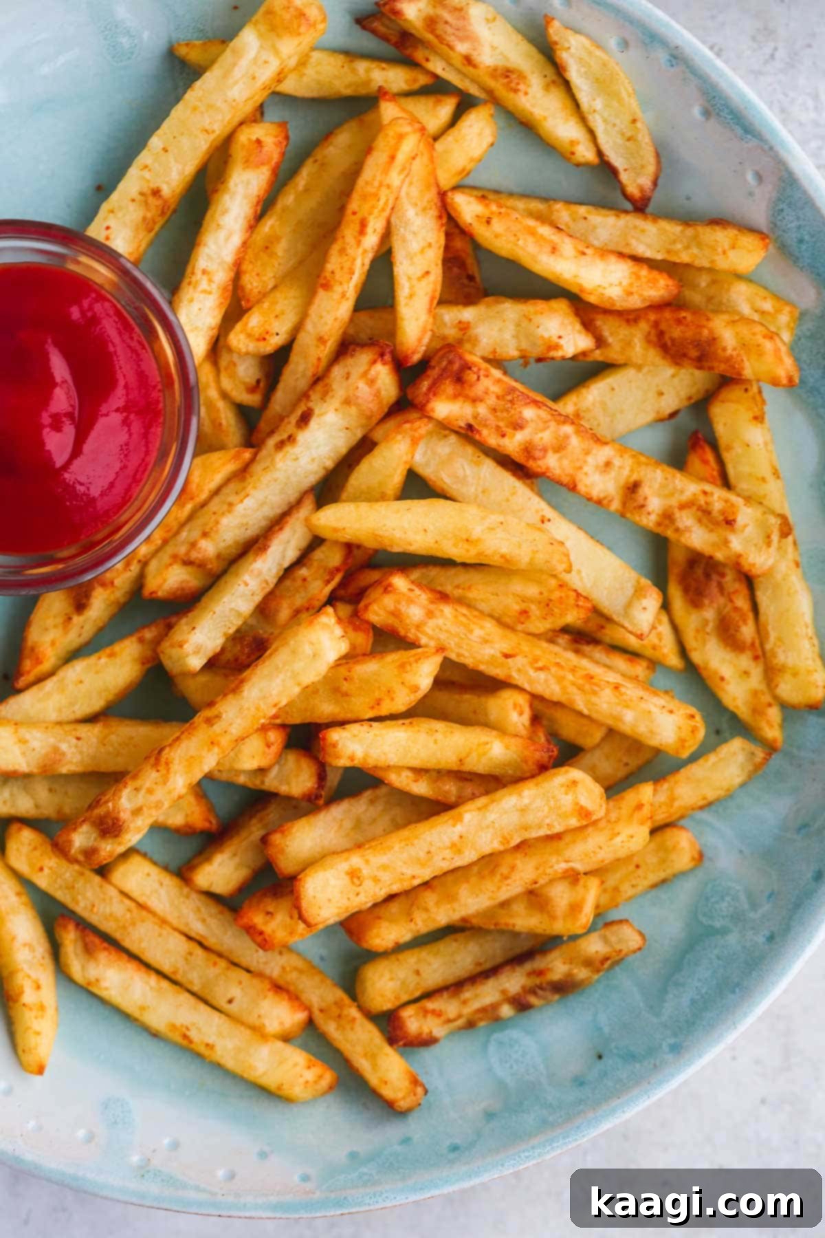 Easy and quick Air Fryer French Fries, delicious, crispy, and low in calories.