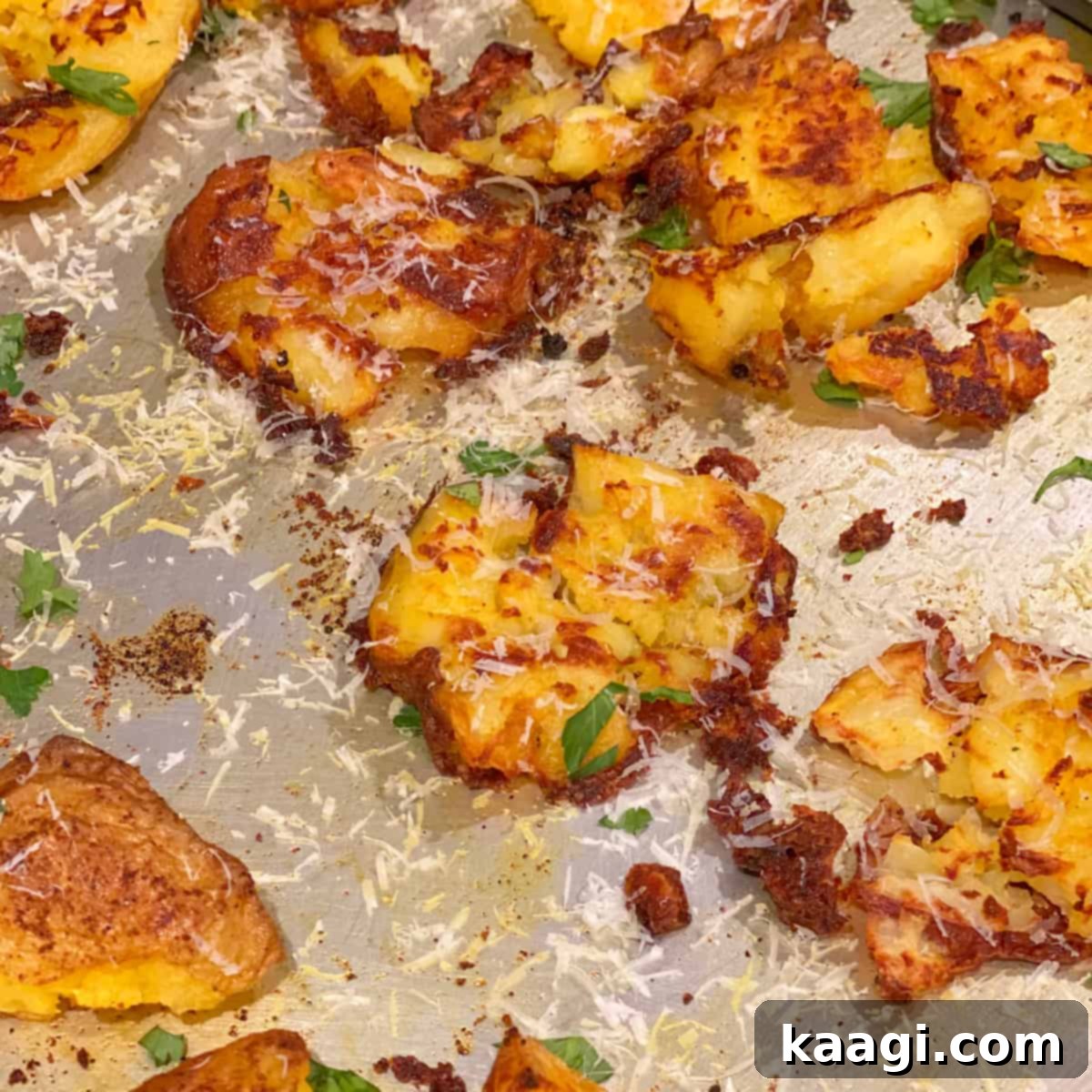 Crispy Garlic Smashed Potatoes, baked and air-fried for a perfect game day snack.