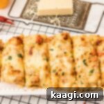 A beautifully sliced loaf of crawfish bread, ready to be served and enjoyed.