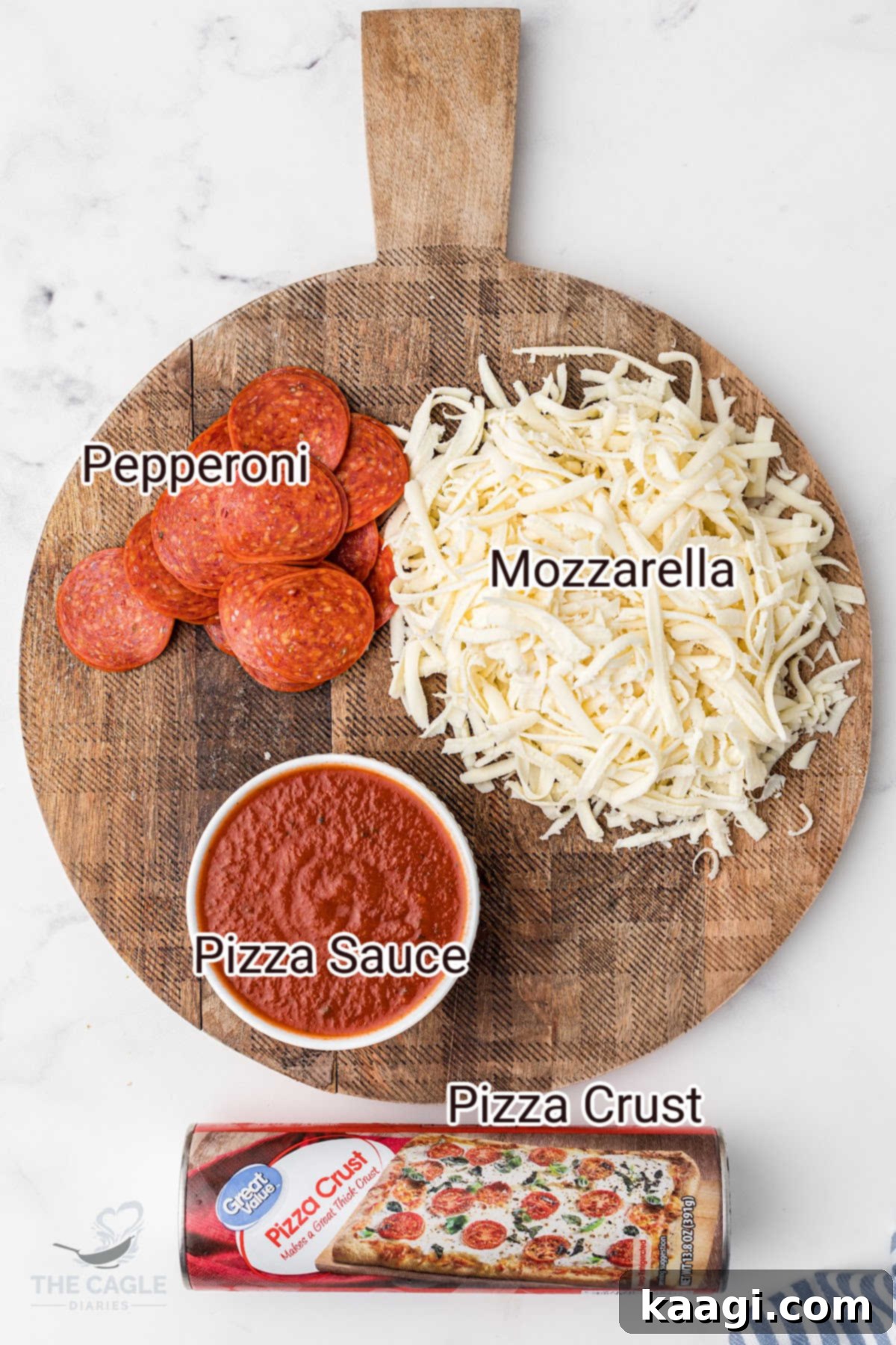 air fryer pizza rolls ingredients laid out: pizza dough, sauce, cheese, pepperoni
