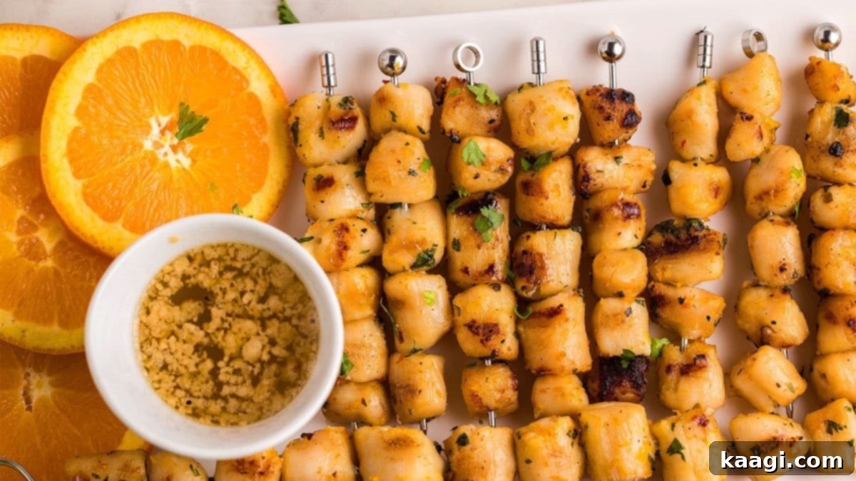 Grilled scallop skewers with citrus garlic smoked butter sauce