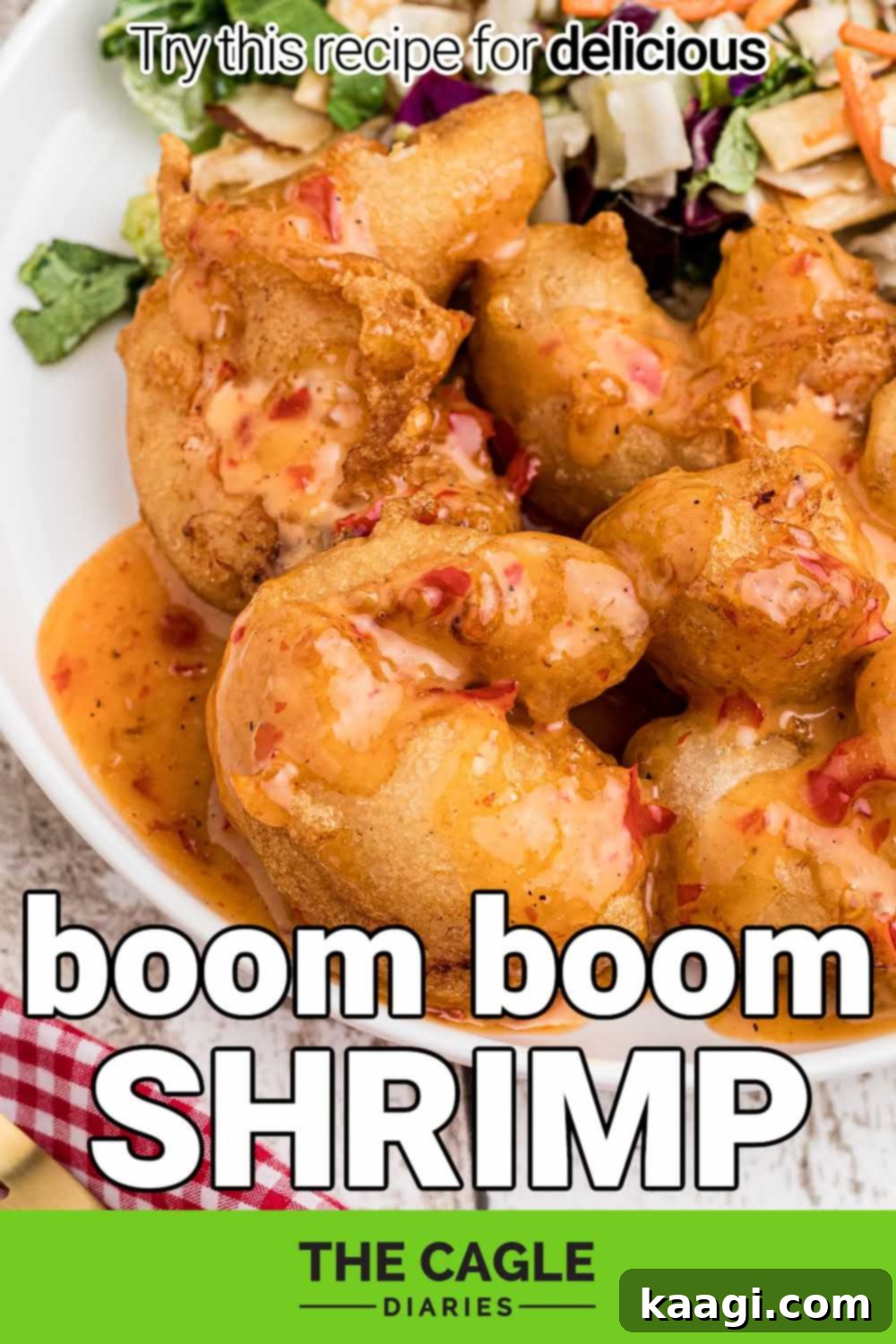 Close up of a plate of boom boom shrimp, artistically presented for a Pinterest pin, showcasing the crispy texture and delicious sauce.