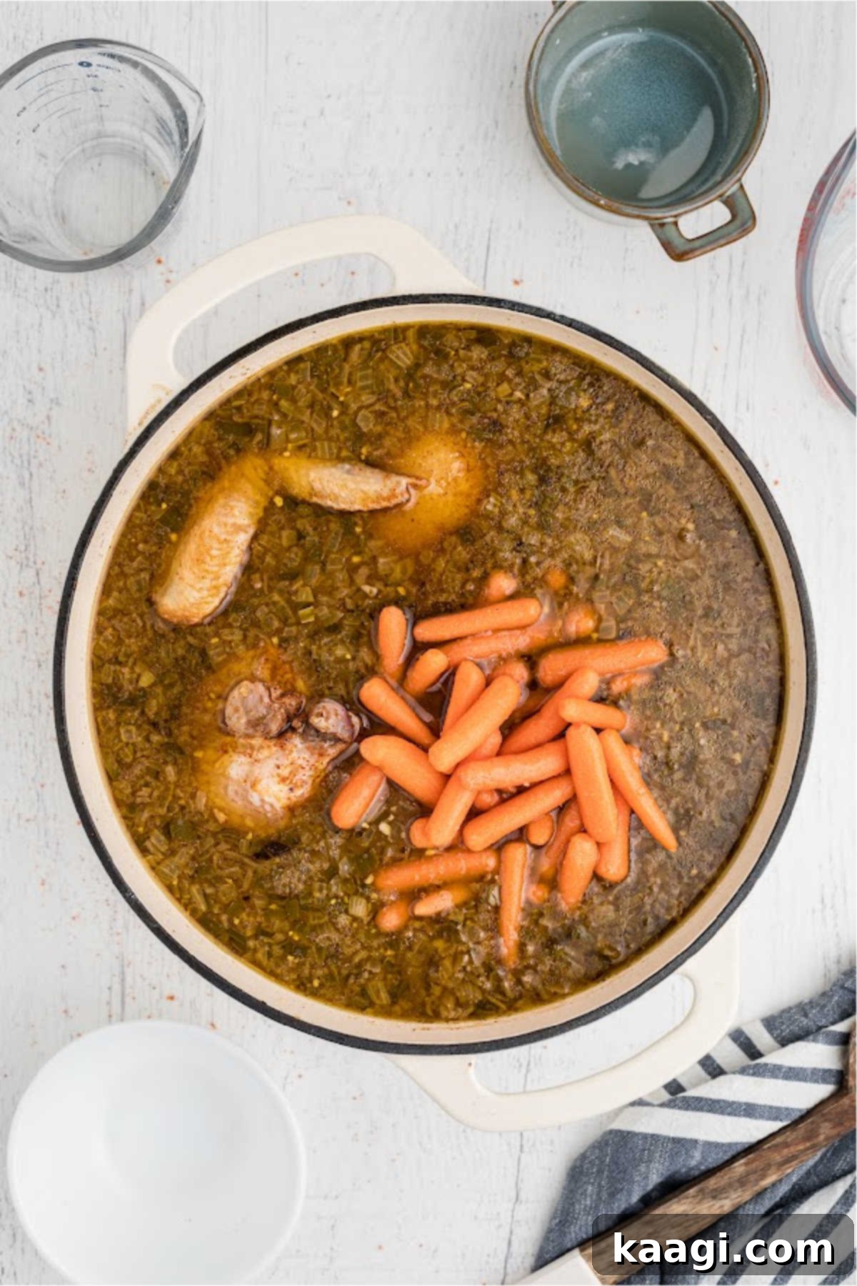 Carrots with chicken added to a stew.