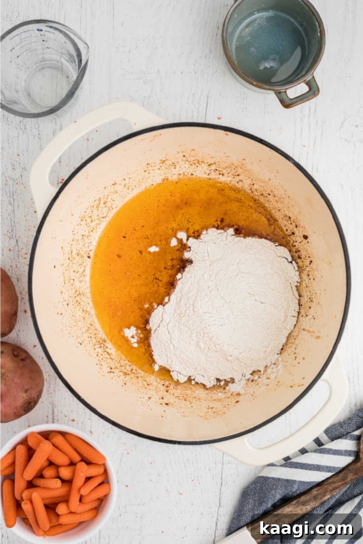 Flour added to a pot with grease.