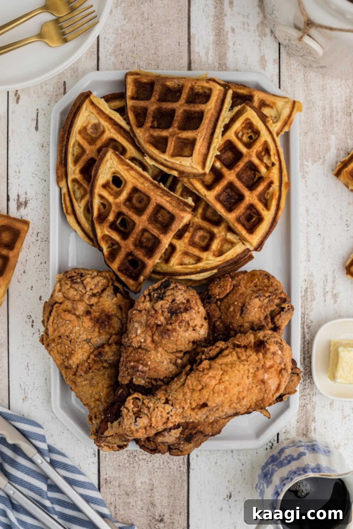 A platter with fried chicken and waffles.