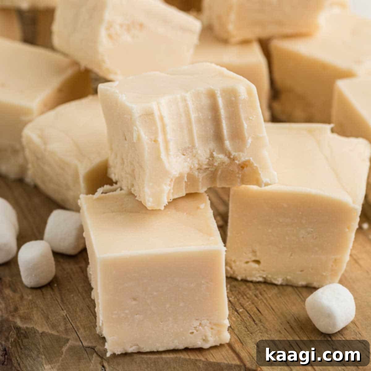 76 Effortless Christmas Goodies 14 Vanilla Fudge with a bite taken out