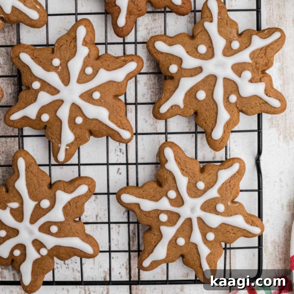 76 Effortless Christmas Goodies 33 Snowflake Gingerbread Cookies decorated with royal icing