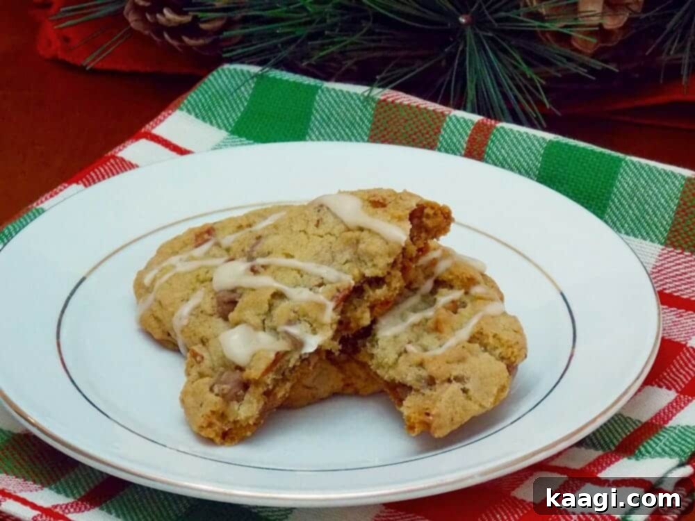76 Effortless Christmas Goodies 38 Chewy Mocha Toffee Chip Cookies on a cooling rack
