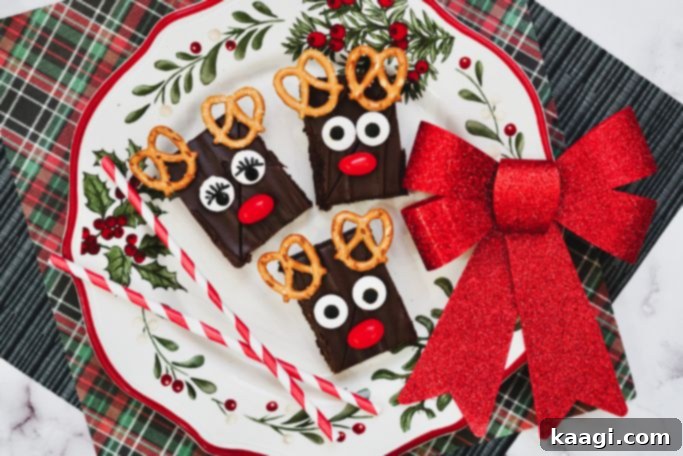 76 Effortless Christmas Goodies 7 Easy Reindeer Brownies decorated with pretzels and candy eyes