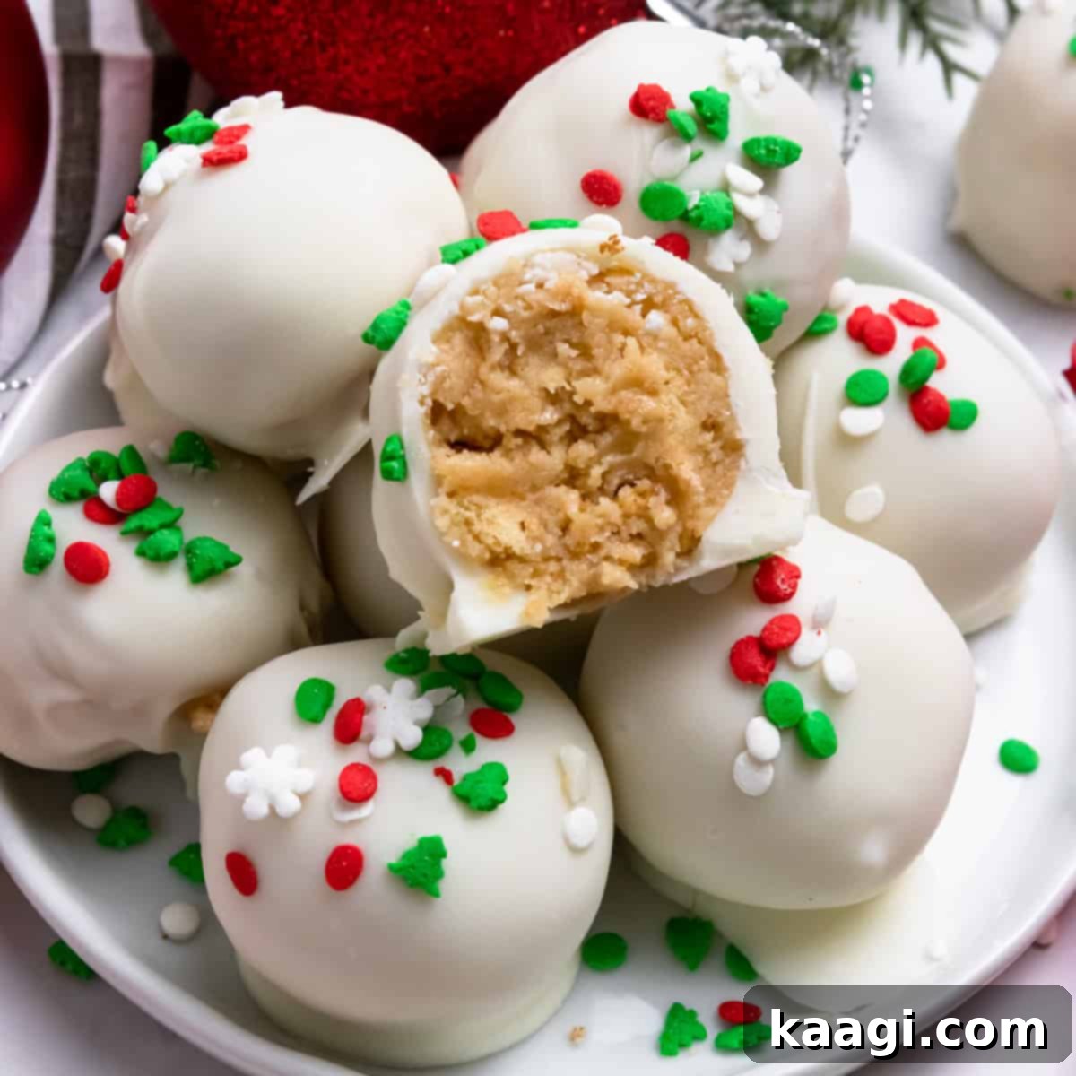 76 Effortless Christmas Goodies 78 Easy Christmas Golden Oreo Balls coated in white chocolate