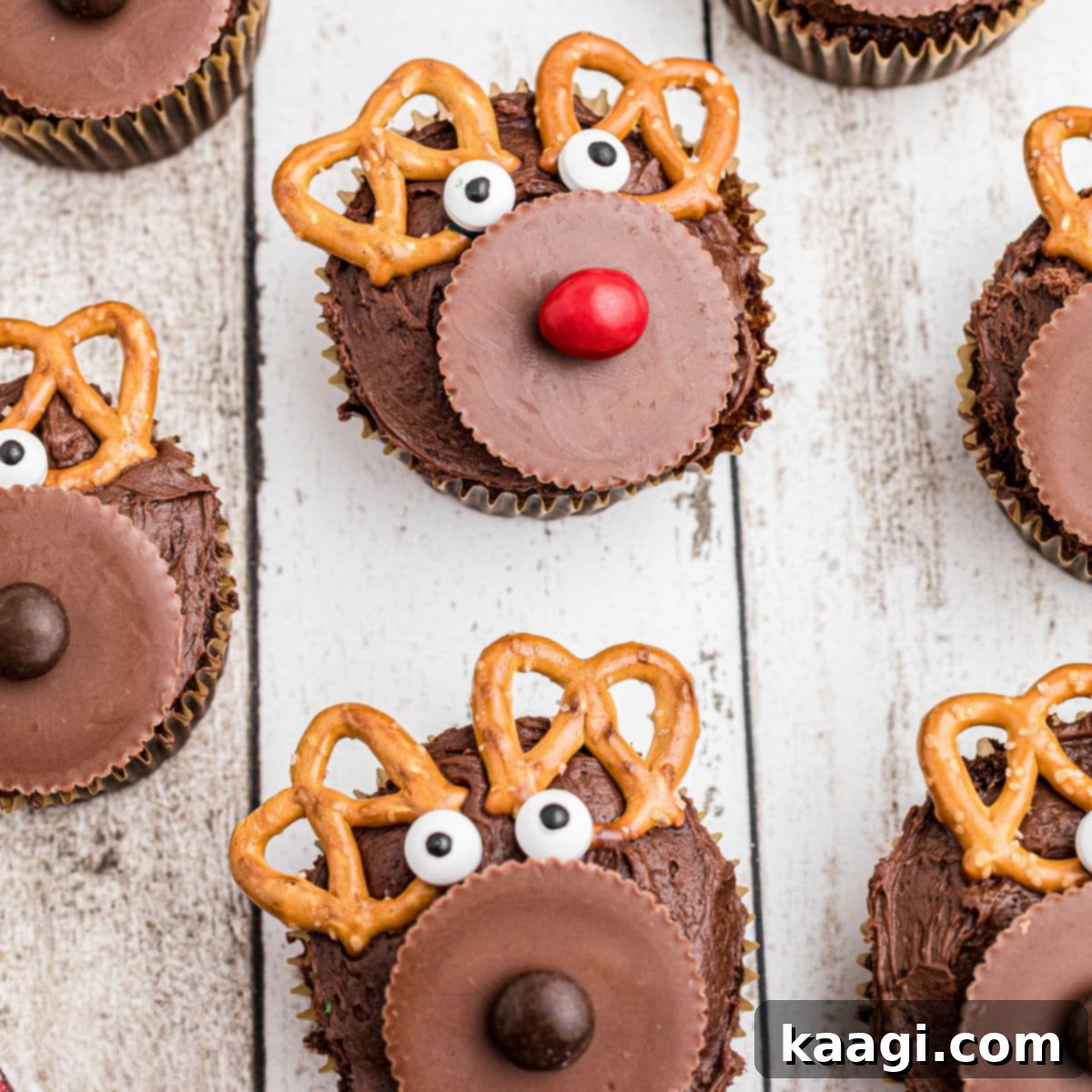 76 Effortless Christmas Goodies 80 Reindeer Cupcakes with pretzel antlers and red noses