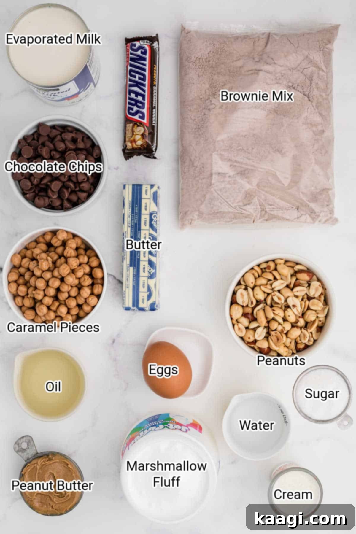 Ultimate Snickers Brownies 3 ingredients for snickers brownies all laid out with their names typed over the top