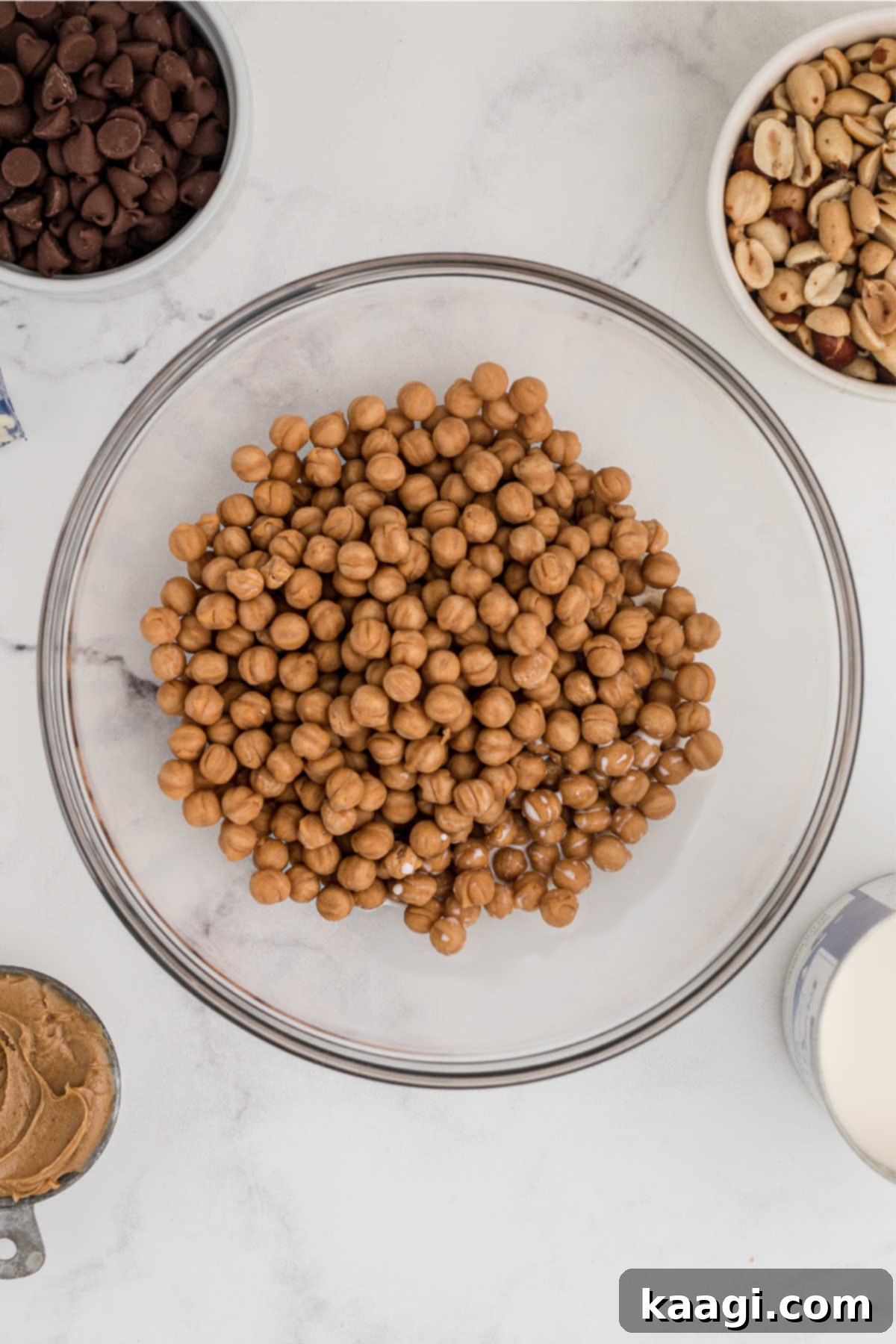 Ultimate Snickers Brownies 6 Caramel pieces in a bowl, ready to be microwaved.