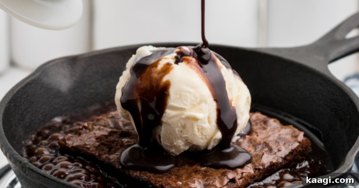 The Only 5 Brownie Recipes You'll Ever Need 6 Close up of a sizzling brownie served hot in a skillet, topped with melting ice cream and a luscious pour of chocolate sauce, a truly decadent brownie recipe.