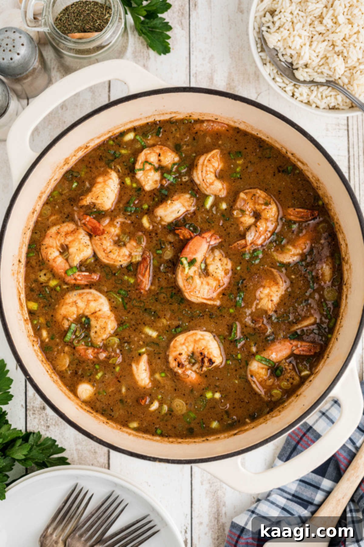 A large Dutch oven cooking a shrimp etouffee.