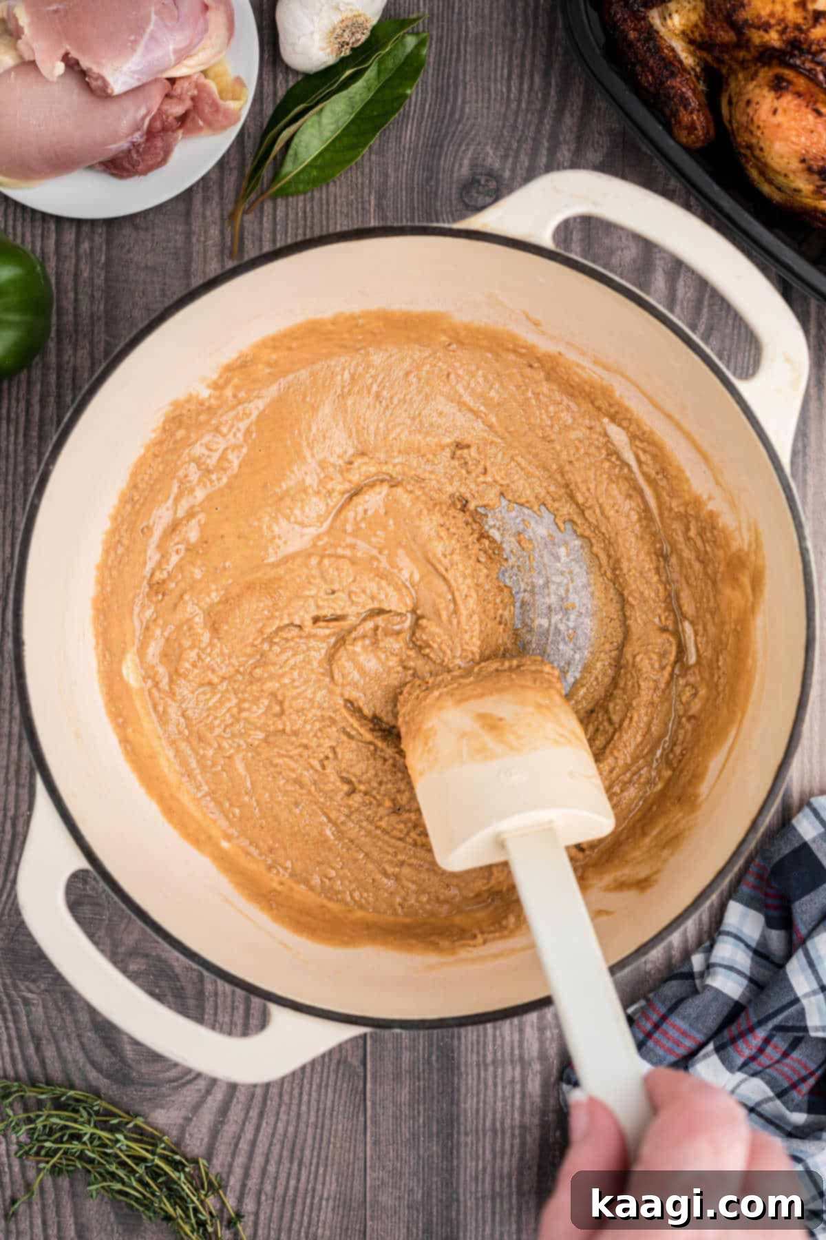 Crafting the Deep Flavor of Dark Roux 6 A medium-colored roux, resembling peanut butter, on its way to becoming a dark roux.