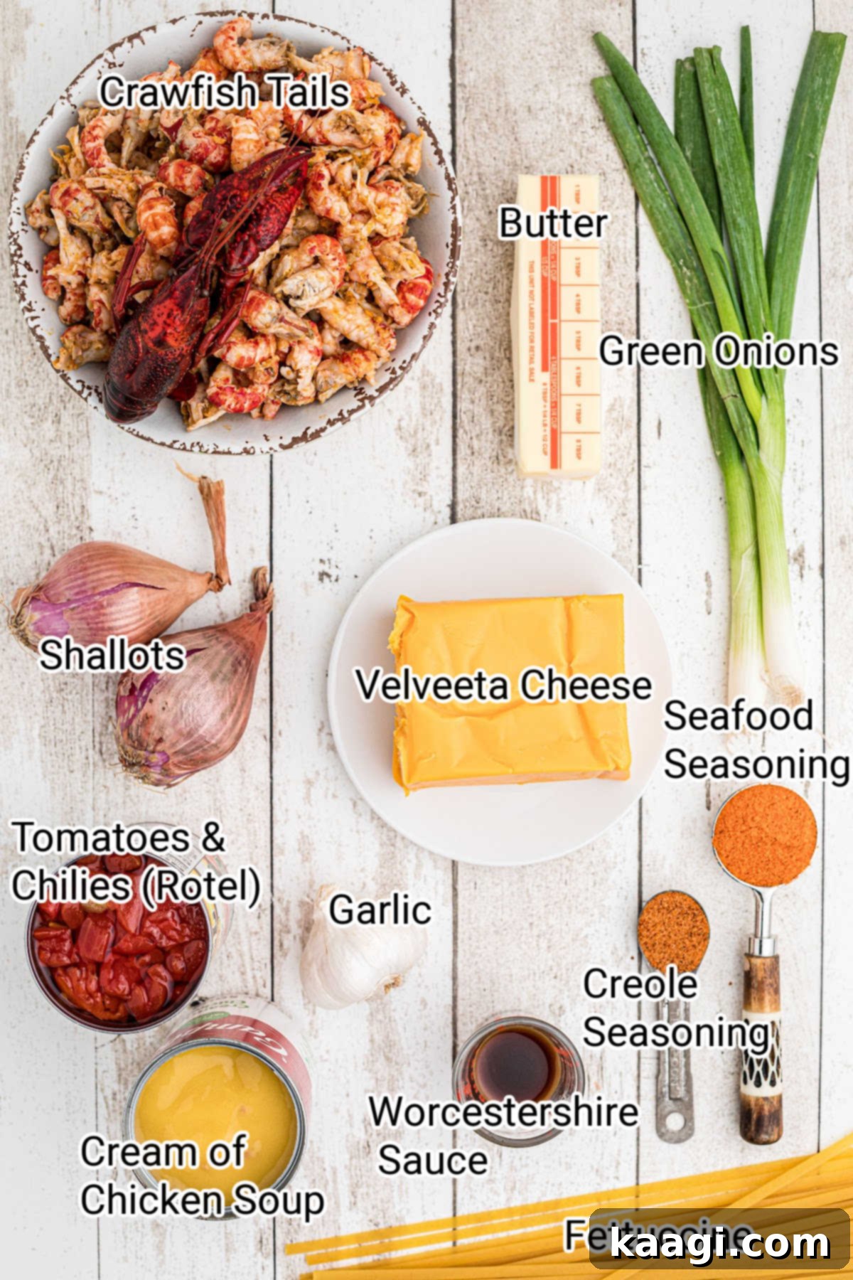 Creamy Cajun Crawfish Fettuccine 3 All the necessary ingredients for a crawfish fettuccine recipe, neatly arranged and labeled on a kitchen counter.