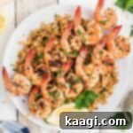 Overhead shot of perfectly grilled Texas Roadhouse shrimp on skewers, served over seasoned rice, ready to be enjoyed.
