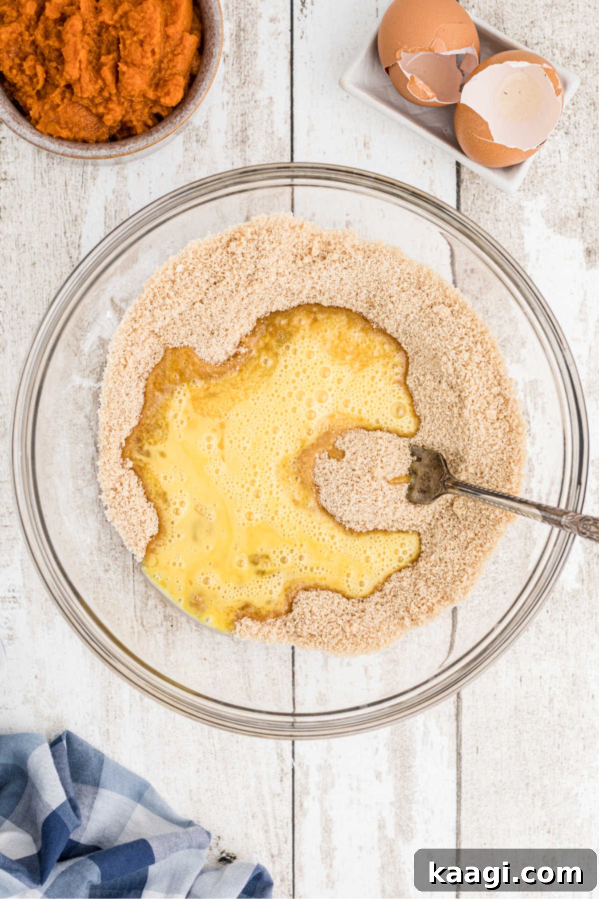 Amish Farmhouse Pumpkin Pie 9 Eggs added to a sugar mixture.