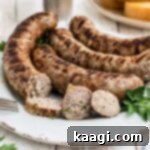 Crafting Authentic Boudin at Home 13 close up of a plate of homemade boudin sausage with a few slices taken from one of the links