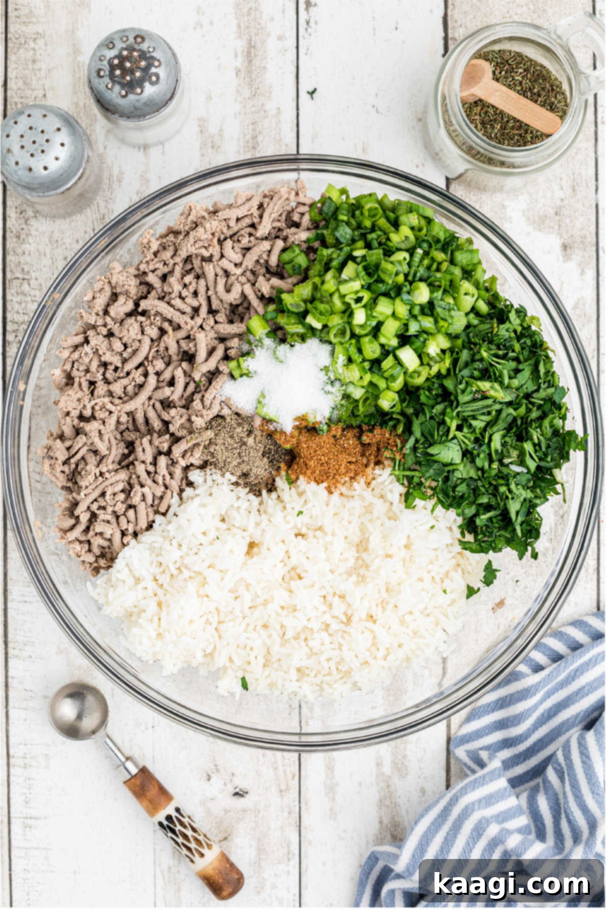 Crafting Authentic Boudin at Home 8 A large mixing bowl with ground meat, rice, and other ingredients for boudin