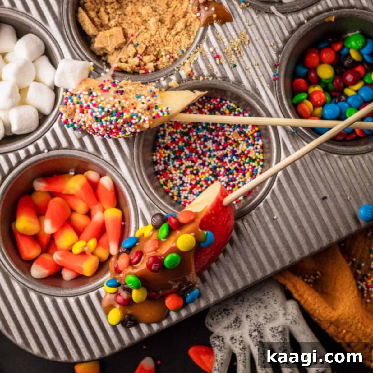 DIY Sliced Caramel Apple Bar with various toppings.