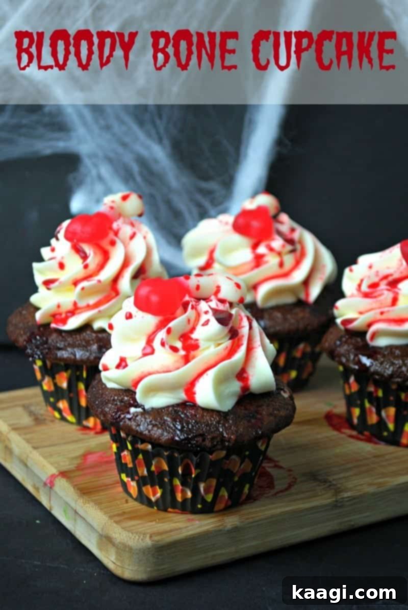 Bloody bone Halloween cupcakes.