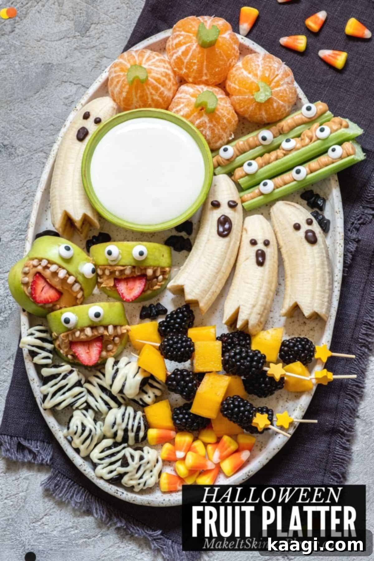 Healthy Halloween Fruit Platter with spooky fruit arrangements.