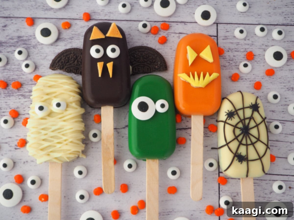 Halloween cakesicles decorated for a spooky party.
