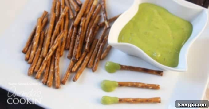 Boogers on a Stick, a gross yet delicious Halloween party food.