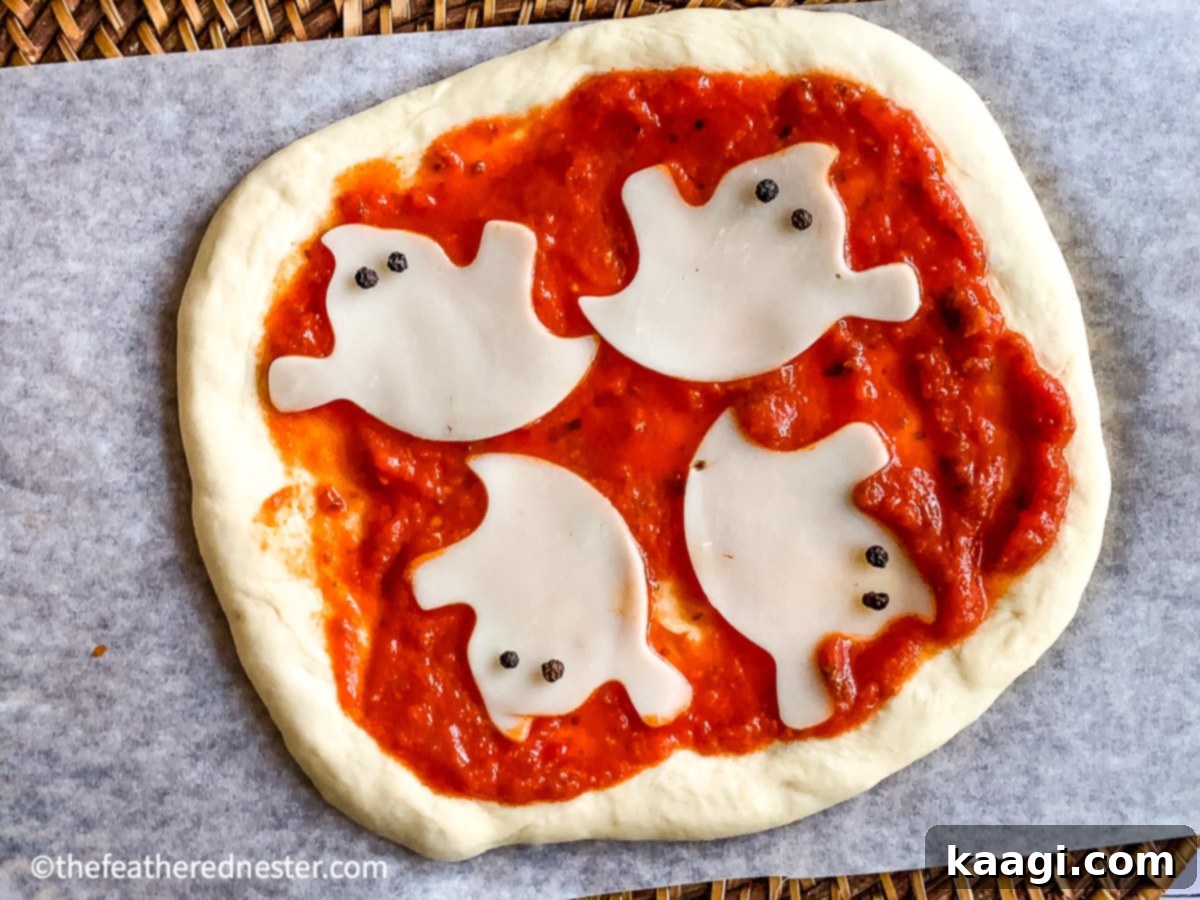 Halloween Pizza Ideas, mini spooky pizzas.