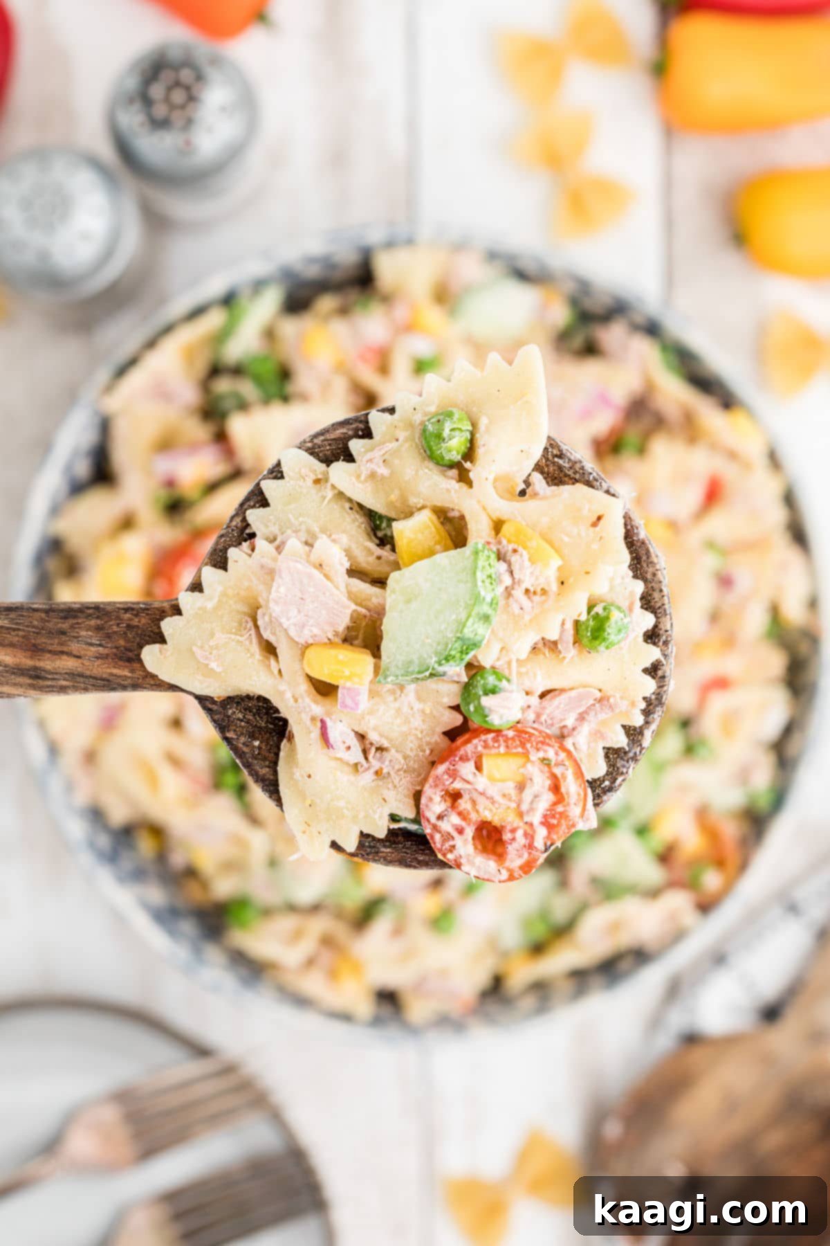 Creamy Tuna Pasta Salad 6 a spoonful of creamy tuna pasta salad with vegetables and pasta