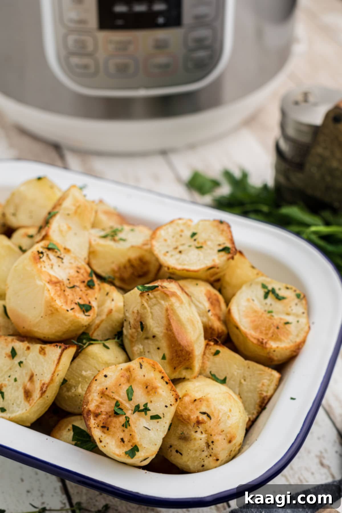 Pressure-Perfect Crispy Spuds 13 crispy potatoes in front of an instant pot