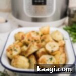 Pressure-Perfect Crispy Spuds 14 a dish full of crispy potatoes in front of an instant pot
