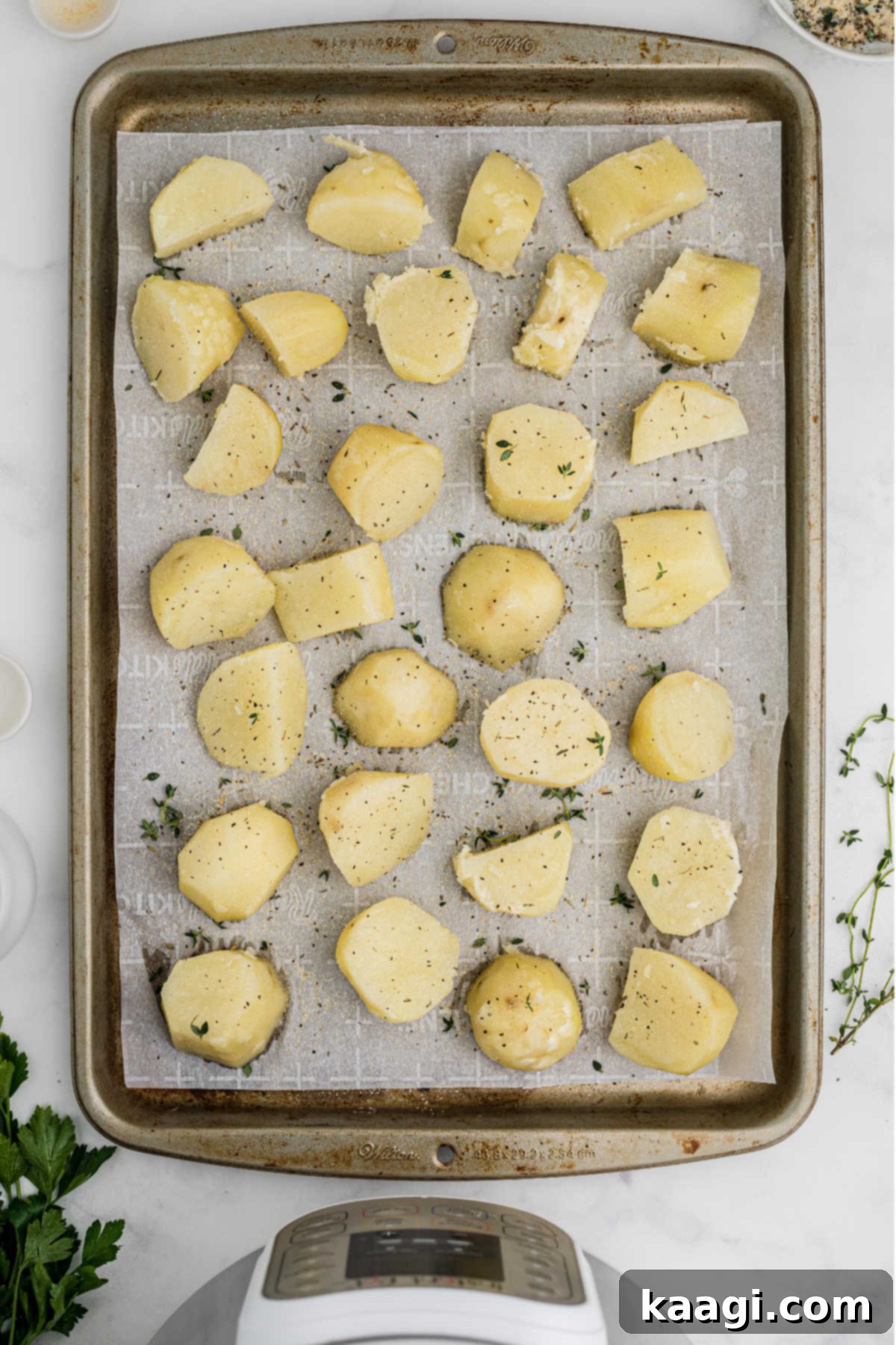 Pressure-Perfect Crispy Spuds 10 Potatoes laid out on a baking sheet.