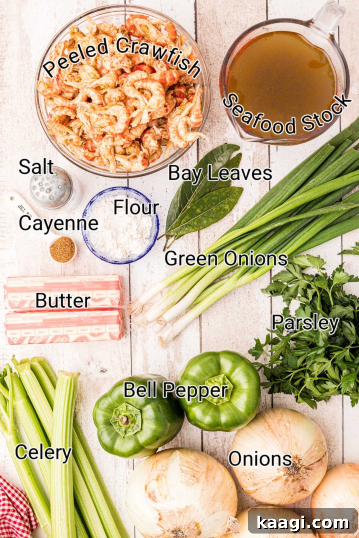 a layout of all the ingredients needed in a crawfish etouffee