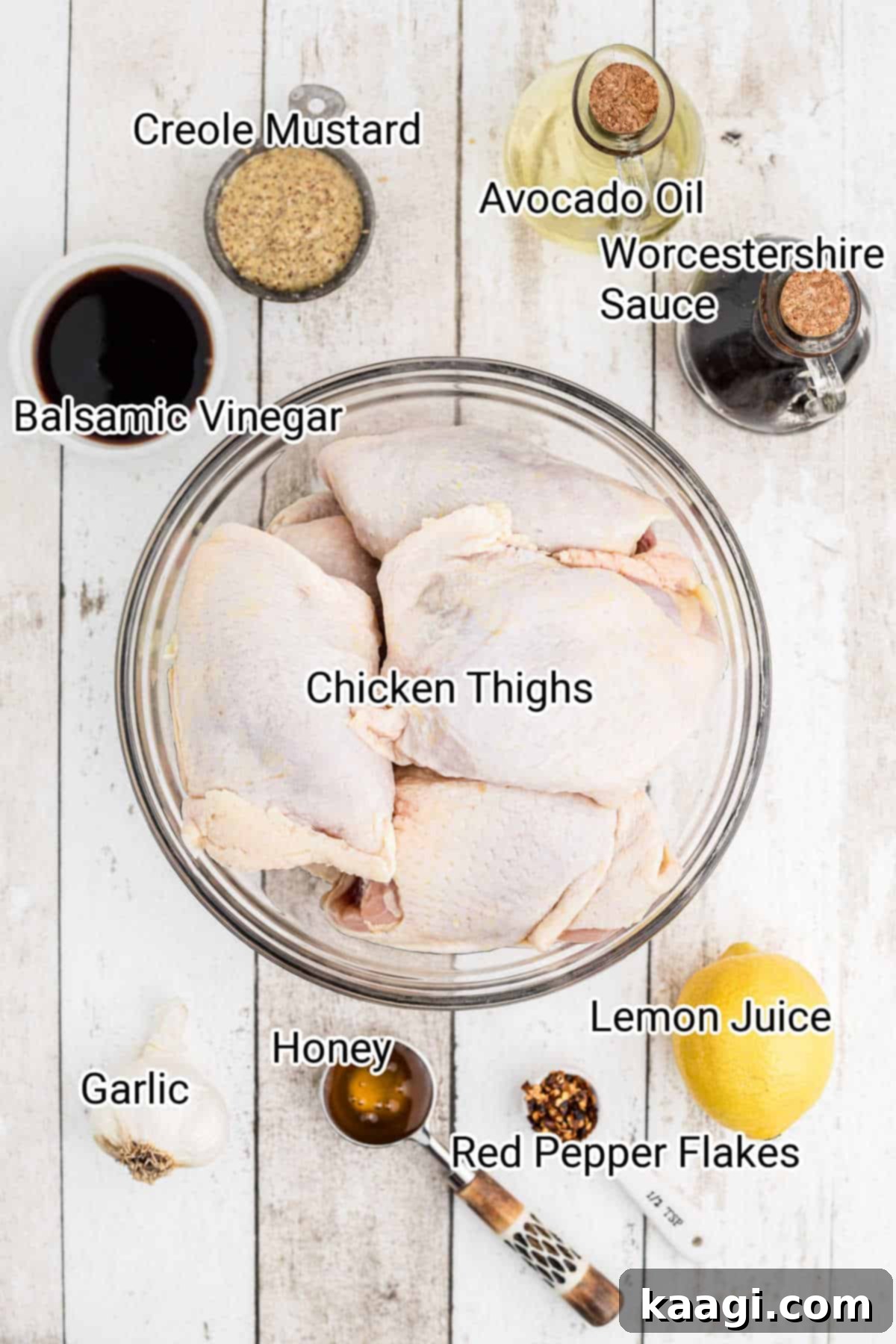 A flat lay image displaying all the fresh ingredients needed to make the marinade for succulent smoked chicken thighs.