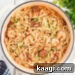 close up shot from overhead of a large pot of shrimp and crawfish pastalaya.