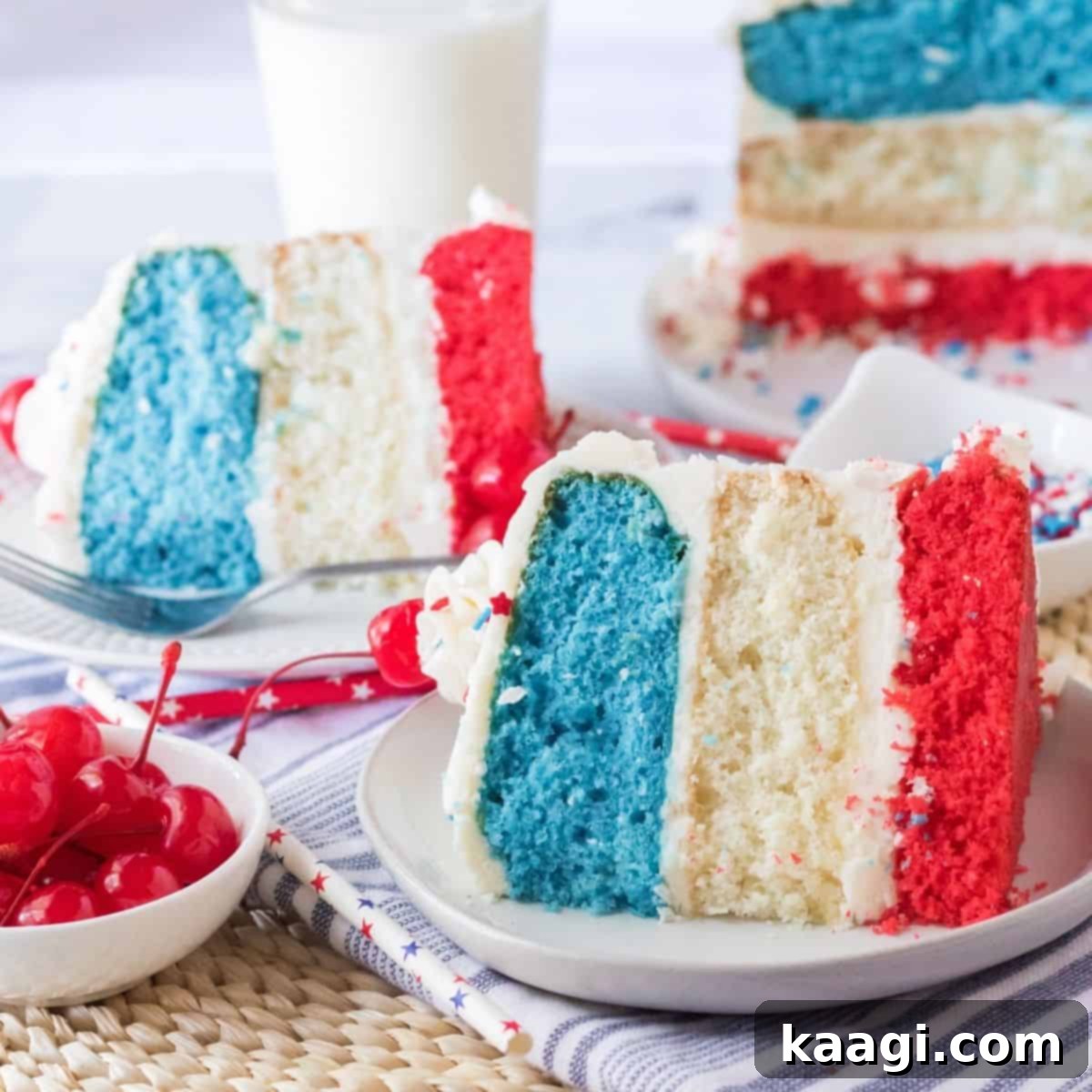 A vibrant Red White and Blue Cake, showcasing its three festive layers and smooth frosting, ready for celebration.