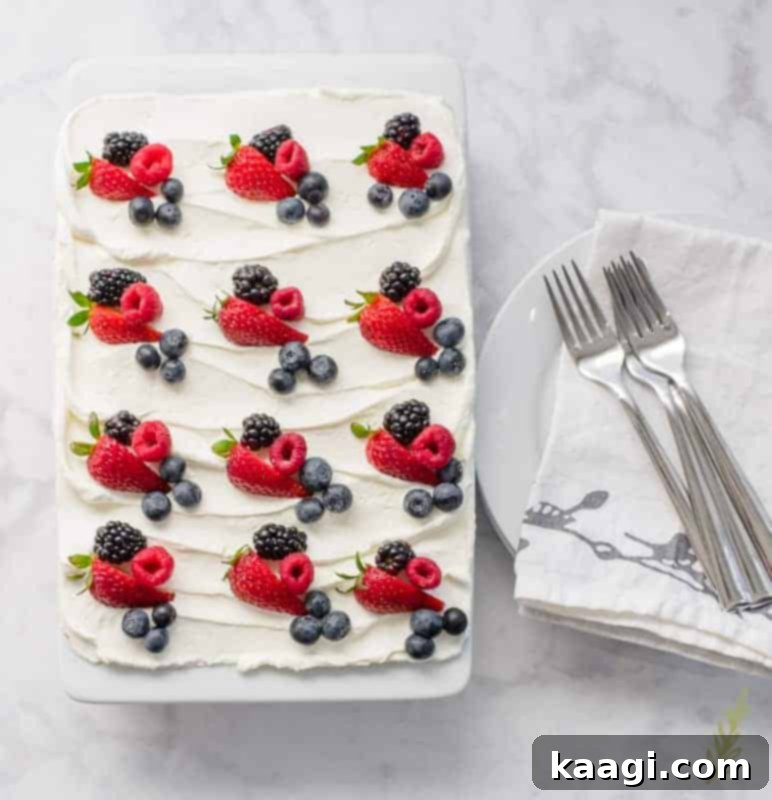 Berry Tiramisu (Berry-Flavored Tiramisu) layered with ladyfingers, mascarpone cream, and fresh berries.
