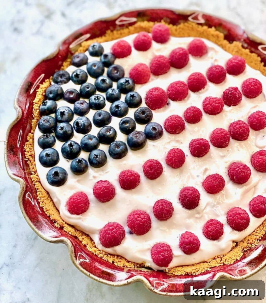 A festive Red, White and Blue Pie, showing its patriotic color scheme and fruit filling.