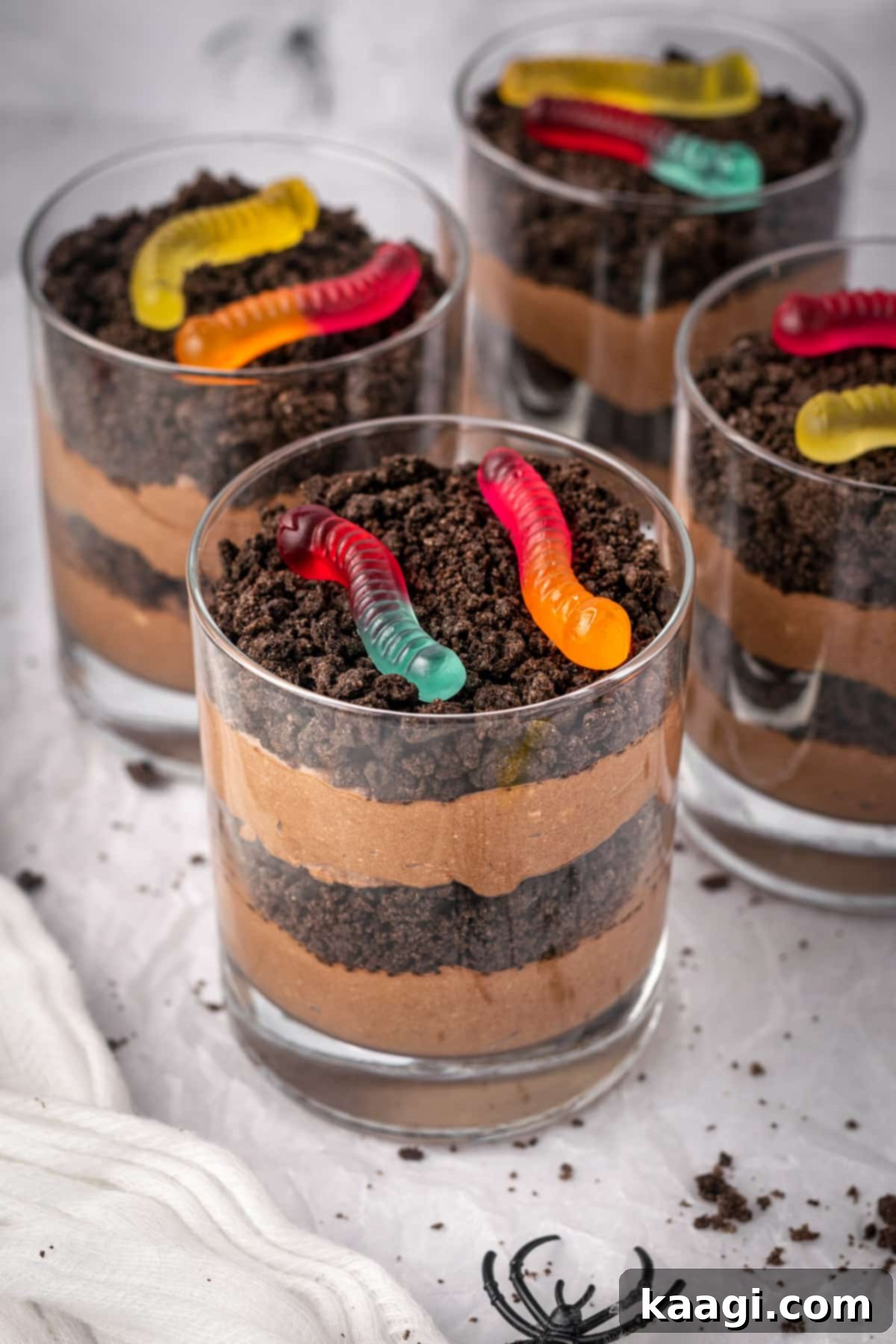 Healthy Halloween Dirt Cups, gluten-free, dairy-free, and vegan with coconut milk mousse and crushed sandwich cookies.