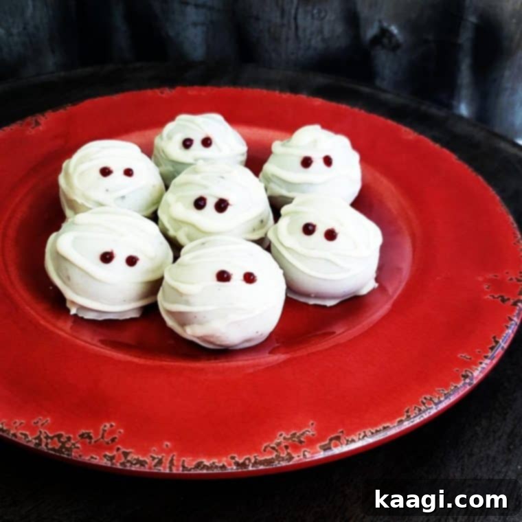 Three Ingredient Oreo Mummy Truffles, decorated for Halloween.