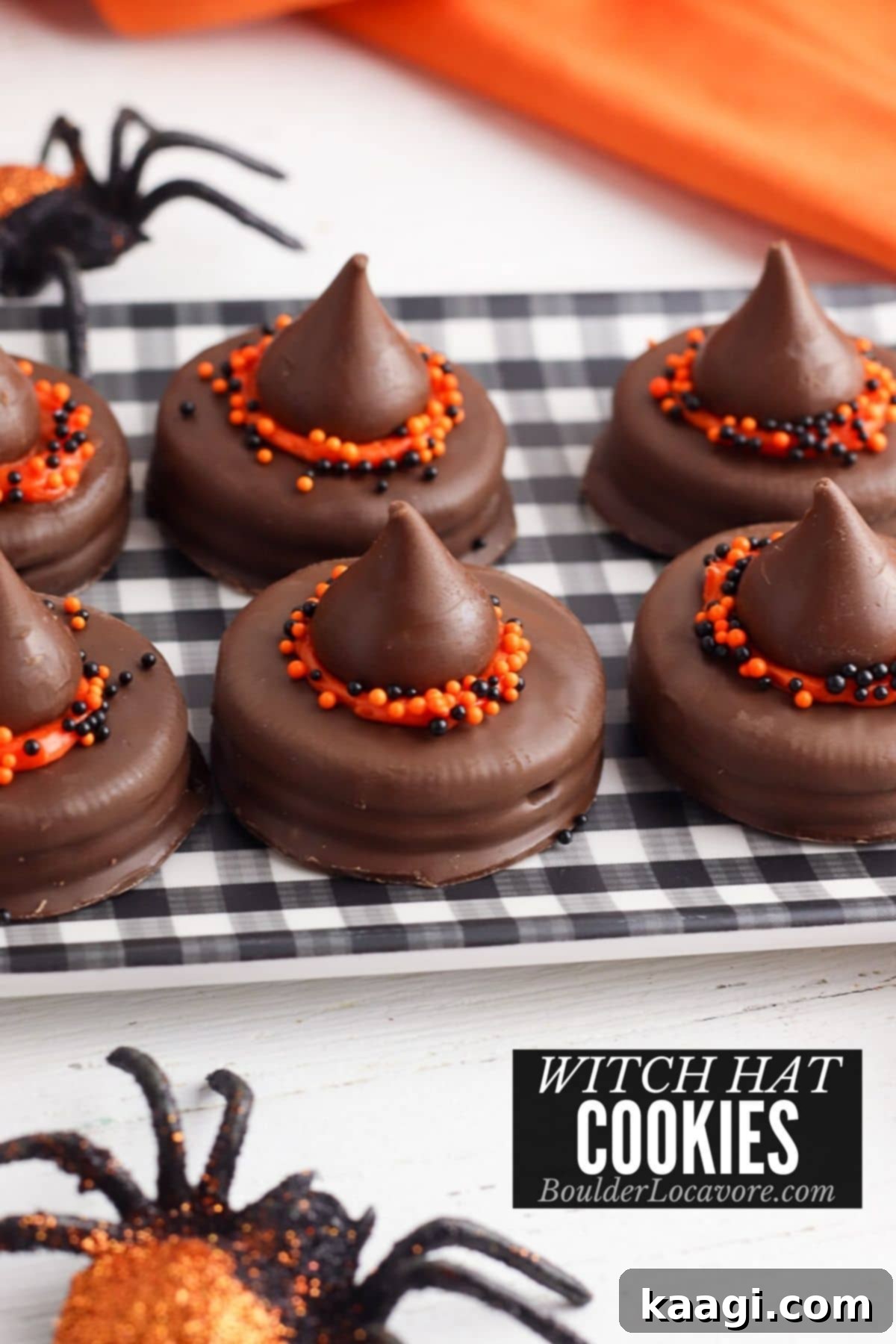 Adorable Witch Hat Halloween Cookies made with Oreos and Hershey Kisses.